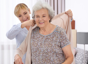 caregiver caring for elder woman