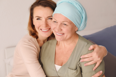 woman visiting her mother with cancer
